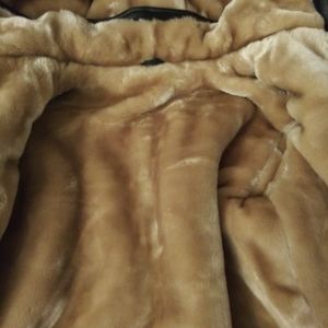 Belted black leather jacket.